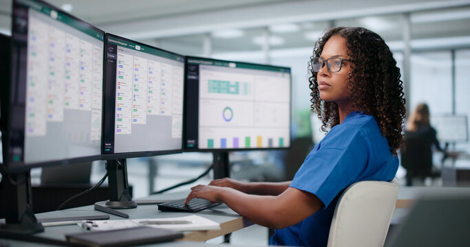 Young African Woman Uses Computer