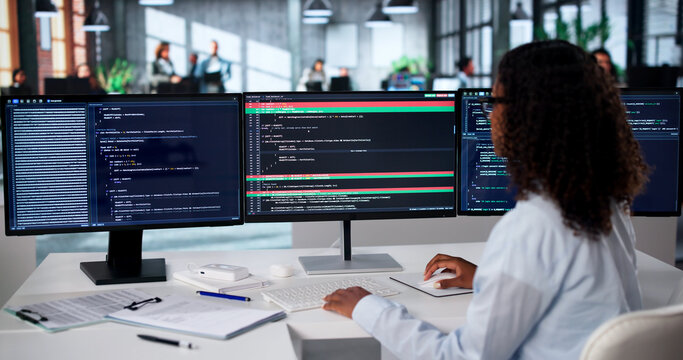 Young African American Woman Software Developer Reviews Code Changes