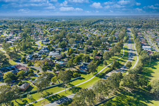 Drone aerial photograph of modern high density housing and the surrounding neighbourhood infrastructure and utilities in the Greater Western Sydney town of Penrith in New South Wales, Australia