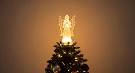 Obraz premium Christmas tree with angel on top.