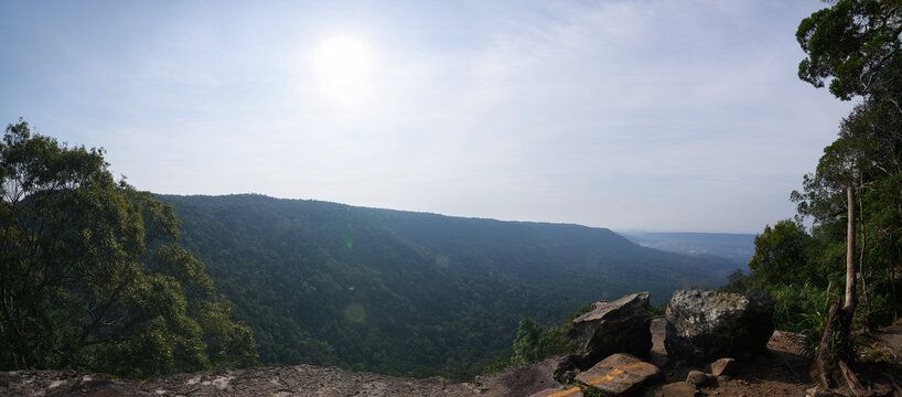 Scenic View of Yai Landscape with Lush Green Hills and Sunlight