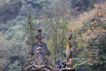 Ancient Chinese rooftop with unique traditional ornamental motifs at Mount Qingcheng in Dujiangyan, Chengdu, Sichuan Province of China © Crystaltmc