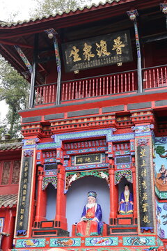 Lord of the Land statues with black plaque with words: Pǔd&ugrave; zh&ograve;ngshēng as name salvation of all sentient beings at Mount Qingcheng in Dujiangyan, Chengdu, Sichuan Province of China