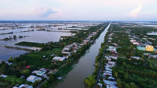 Aerial view of a serene riverside village in Vietnam
