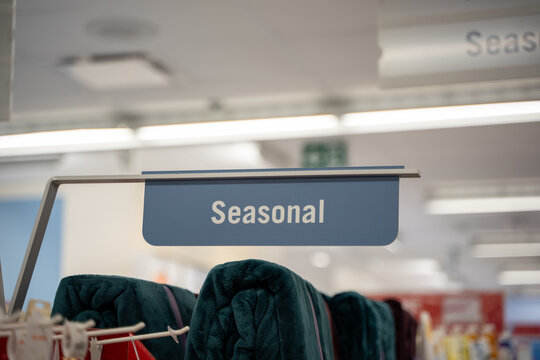 Close up of seasonal section sign inside a retail store.