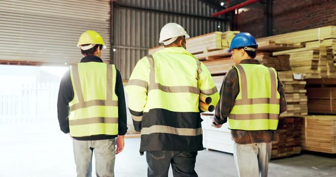 Carpentry, walking and back of people in workshop for manufacturing, timber business and woodwork. Team, contractor and men in warehouse for wood production, furniture restoration and collaboration