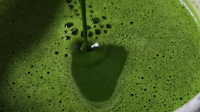 Pouring pure matcha into Chawan.