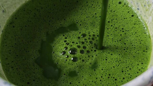 Pouring pure matcha into Chawan.