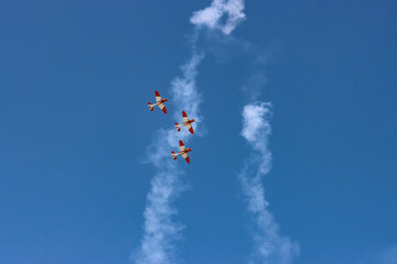 Three Aerobatic Planes Flying in Formation with White Smoke Trails © WILL PHOTOGRAPHY