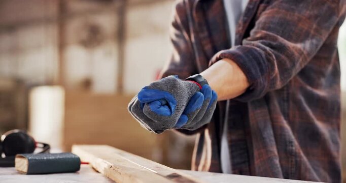 Carpentry, wrist pain or hands in warehouse with strain, muscle issue or overworked in building project. Accident, person or carpenter with discomfort, joint sprain or labor injury in woodworking.