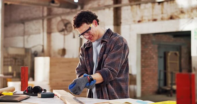 Carpentry, wrist pain or man in factory with massage, muscle issue or fatigue in building project. Accident, overworked or carpenter with joint discomfort, hand strain or labor injury in woodworking.