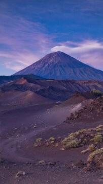 Mountain peak under colorful dusk sky