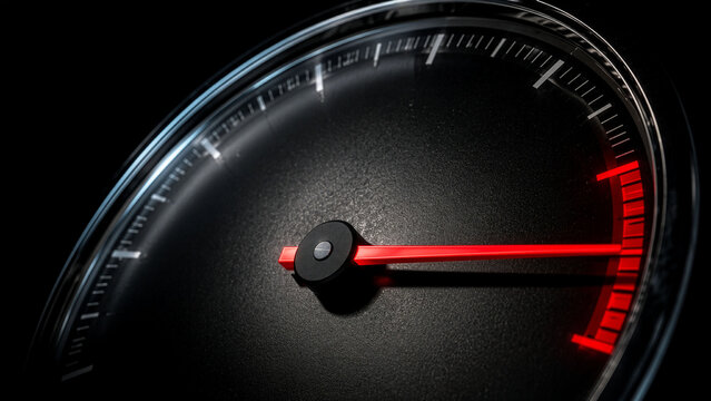 Tachometer in the Red Zone Symbolizing Maximum Performance and Success