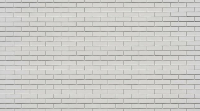 White brick wall background texture modern clean masonry pattern with rectangular blocks arranged in a running bond pattern for architectural design