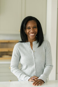 Happy Black woman with a beautiful smile at home