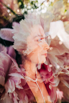 Dreamy double exposure of a woman and peonies