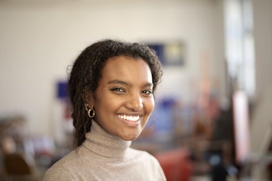 Happy young black woman with a beautiful smile