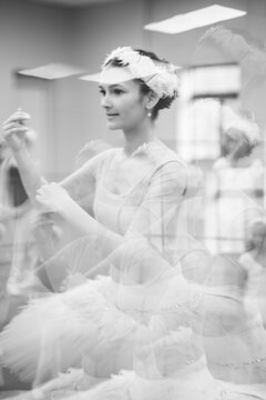 Ballerina dancing with motion blur in artistic black and white