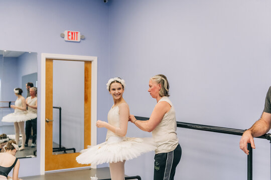 Ballerina preparing for performance in dance studio