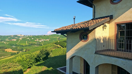 Naklejka premium Scenic View of Barbaresco Vineyards from a Traditional Italian Villa