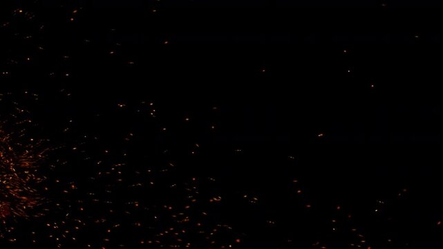 Super Slow Motion Shot of Flying Fire Sparks Isolated on Black Background at 1000fps.