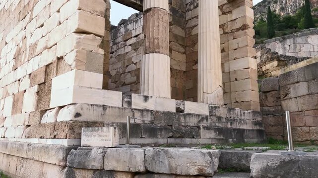 Tilt up to standing columns at the Temple of Apollo, Sanctuary of Delphi, Greece