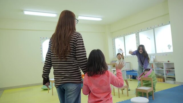 The young children are learning in the classroom.