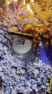 Relaxing Camping Setup at Sunset with Hot Tea