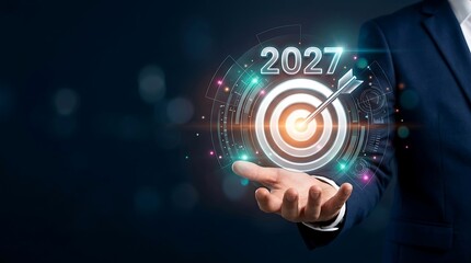 Fototapeta premium Advanced Business Planning for 2027 with Executive Holding Digital Target Representing Success Vision and Innovation