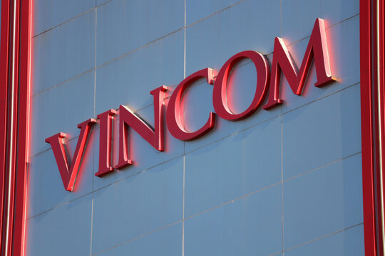 NHA TRANG, VIETNAM - JANUARY 26, 2026: A large Vincom corporate brand name sign mounted on a modern building wall exterior.