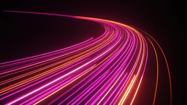 Light trails streak across a dark horizon to represent the rapid transfer of digital information and high speed connectivity within modern fiber optic networks throughout our global society today.