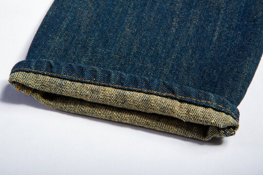 Detailed image of jeans on a white background