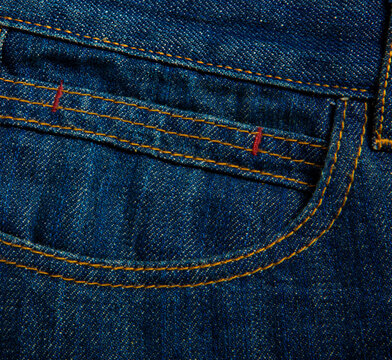 Detailed image of jeans on a white background