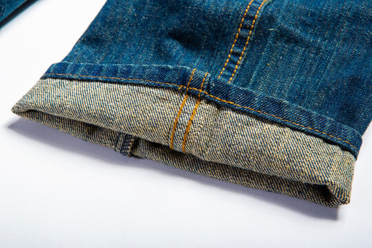 Detailed image of jeans on a white background