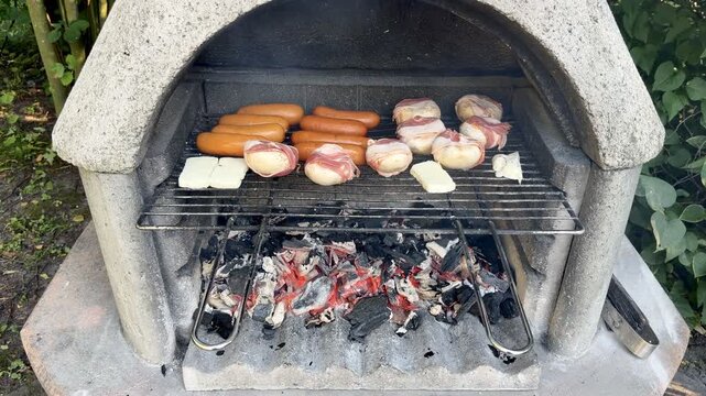 Sausages Bacon Rolls and Cheese Grilling on Charcoal Grill