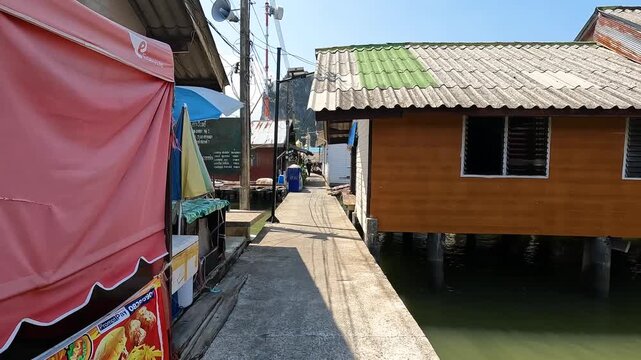 Panyee Island or Koh Panyi is a village built on stilts in Phang Nga Bay and is a Muslim fishermen island - Famous The floating soccer fields in Phang nga Thailand
