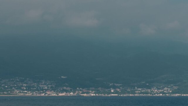 Distant Cityscape Across the Bay Viewed from an Inlet