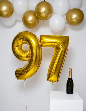 Gold Number 97 Balloon with Champagne Bottle Celebration Setup