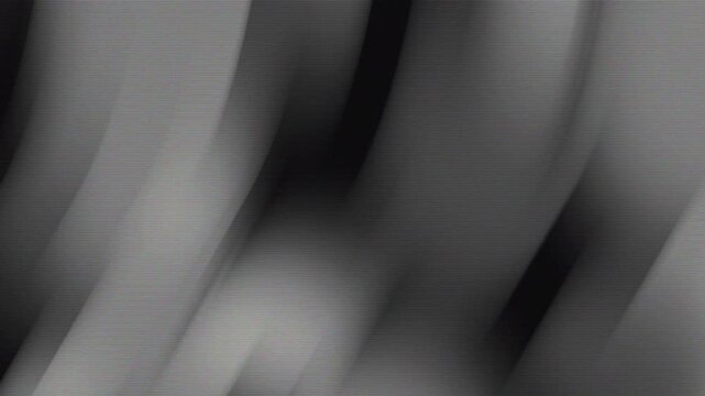 Abstract monochrome gray light streaks motion suitable for backgrounds, banners, digital designs, website headers, and artistic projects needing modern grayscale elements.