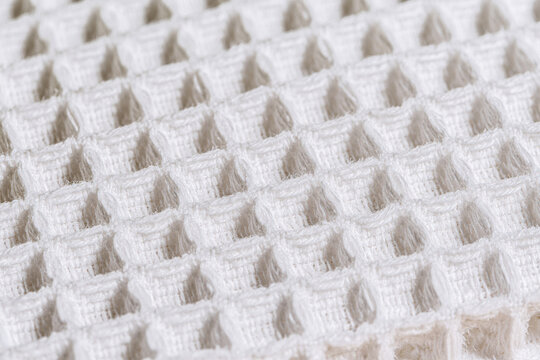 Macro shot of honeycomb waffle fabric pattern