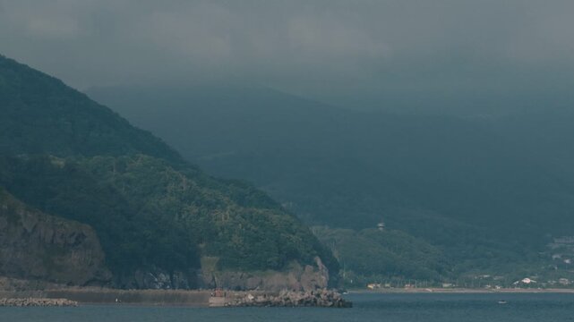 Distant Cityscape Across the Bay Viewed from an Inlet
