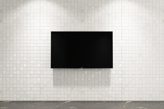 Modern smart TV mockup hanging on white mosaic tile wall with marble floor. 3
