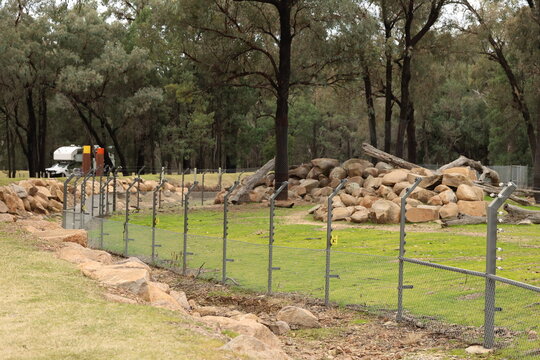 Secure Electric Perimeter Fence Around Wildlife Enclosure in Australian Bushland
