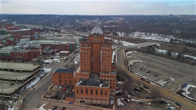 Drone orbit around Mayflower Manor Apartments in downtown Akron Ohio