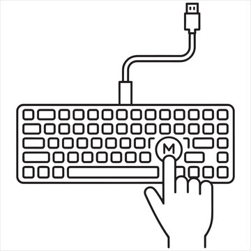 Hand pressing the caps lock key on a usb keyboard