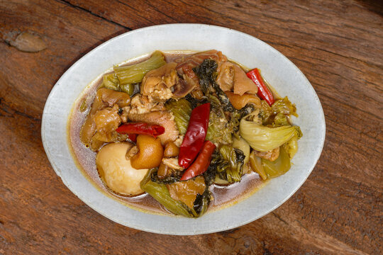 Taiwanese traditional food pork knuckle. Stewed leg pork with sweet gravy sauce style chinese food served with steamed rice. Selective focus. Shooting in studio, Clean food good taste idea concept.