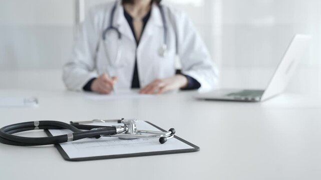 Stethoscope on clipboard, doctor working in office, preparing for patient examination, medical healthcare appointment. Medicine, healthcare and science concept
