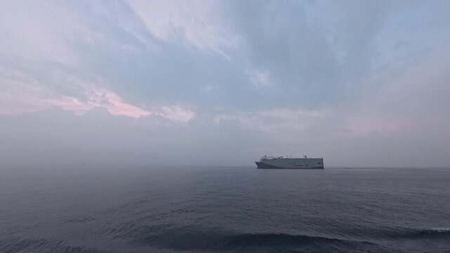 Global automotive shipping industry and international roro trade background landscape at dawn