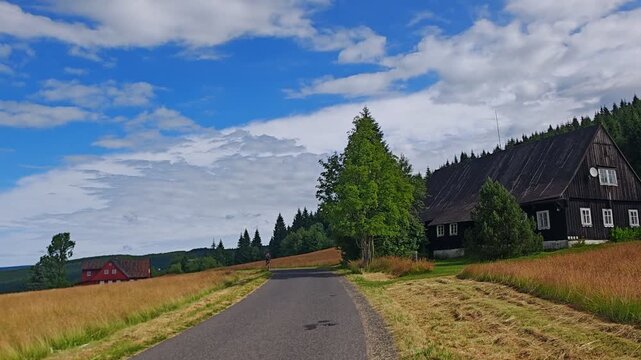 Traditional wooden mountain cottage in the Jizerka area near paths leading to the peat bog landscape