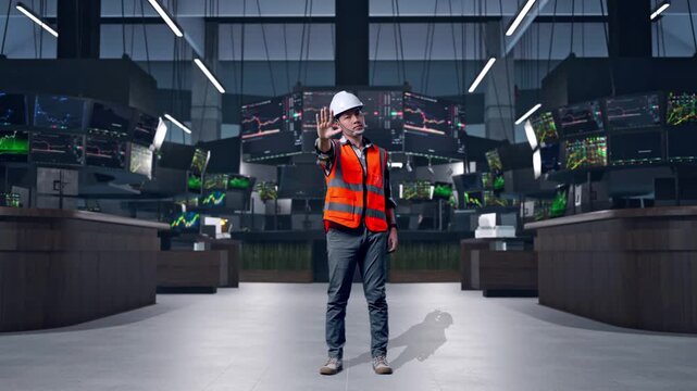 Full Body Of Asian Male Engineer With Safety Helmet Disapproving With No Hand Sign While Standing at Financial Trading Control Room